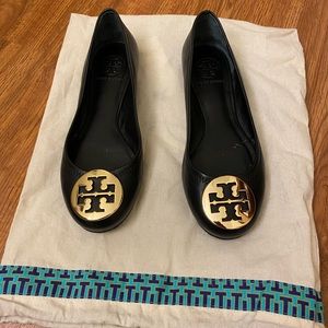 Black Tory Burch ballet flats. No elastic in back.